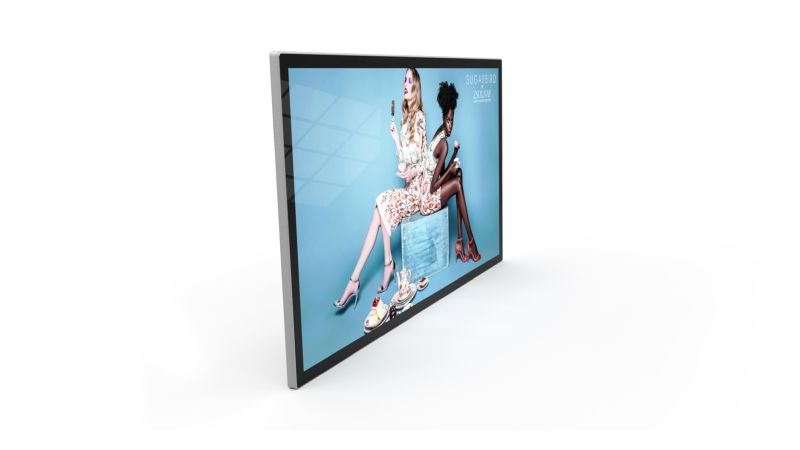 A flat screen tv with a picture of a woman on it.