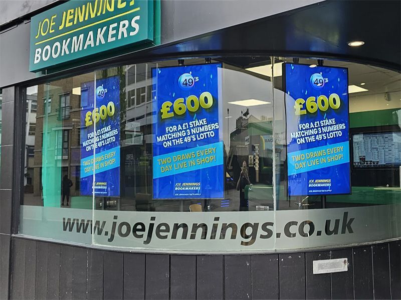 A store front with a sign that says joe jennings bookmakers