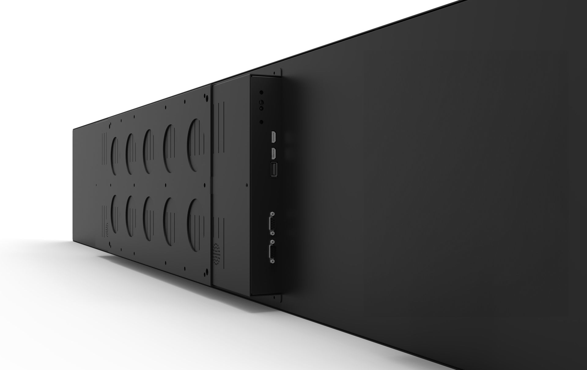 A black box with holes in it is sitting on a white surface.