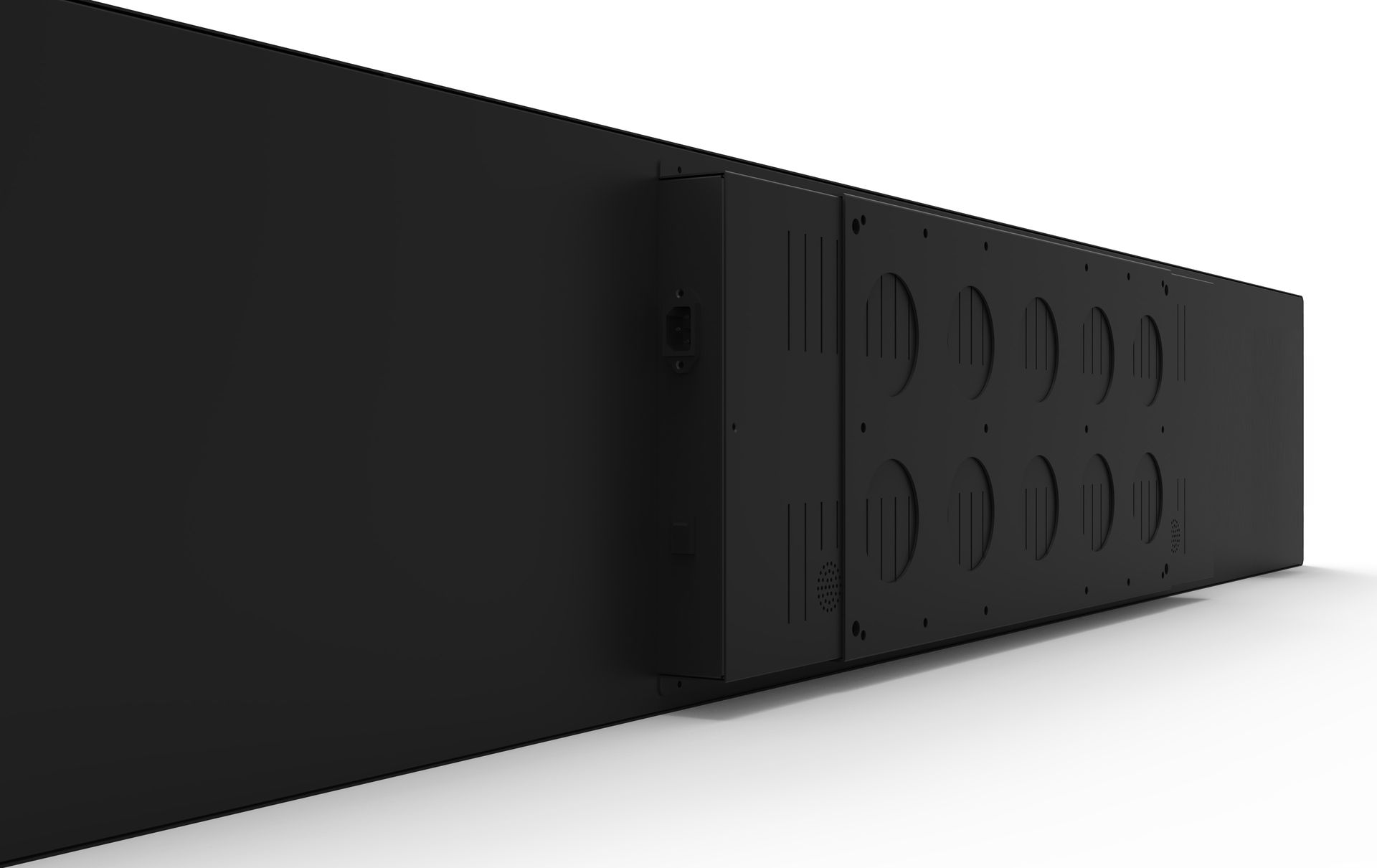 A black box is sitting on a white surface.