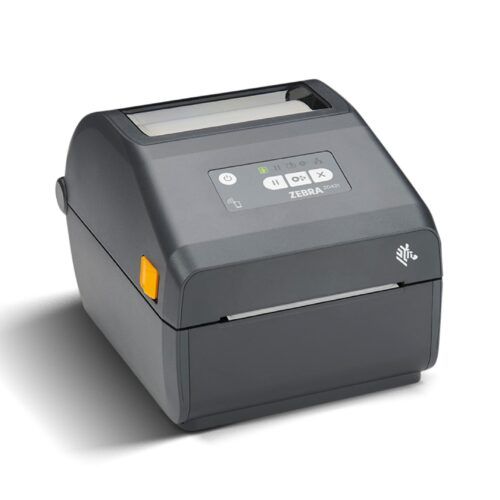 Impresora de etiquetas de escritorio gris con un pequeño panel de control y botón lateral naranja.