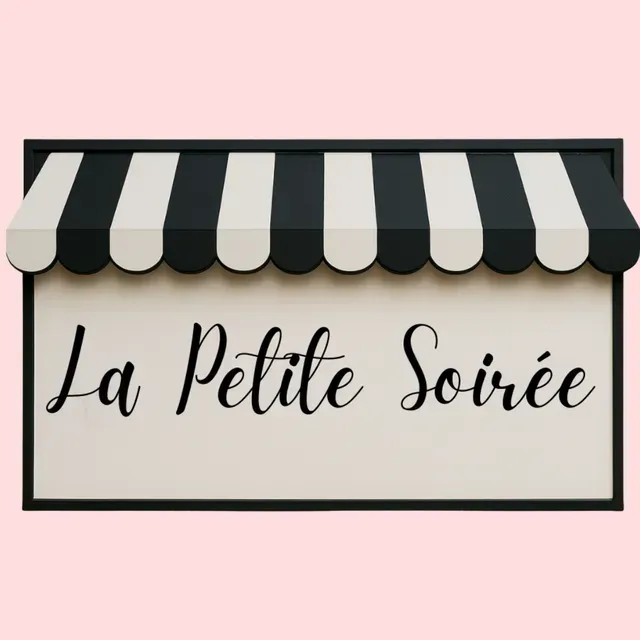 A rectangular sign with a black-and-white striped awning and the text 