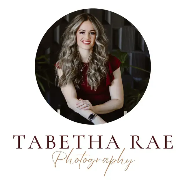A woman in a burgundy top with crossed arms inside a circle frame, with the text 