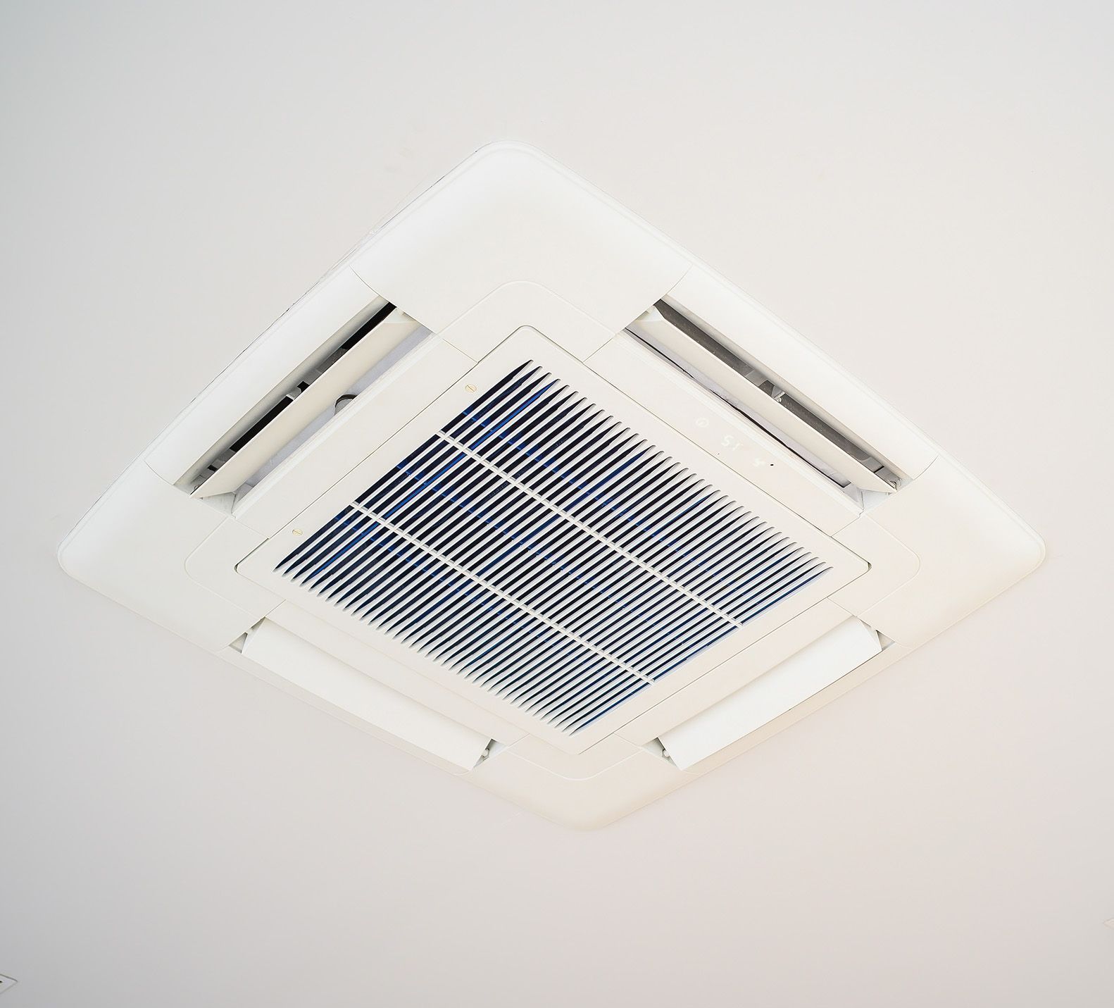 A Ceiling Fan is Hanging from the Ceiling of a Building — Rapidcool Air Conditioning & Electrical in Dapto, NSW