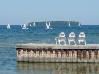 Row of chairs on a dock