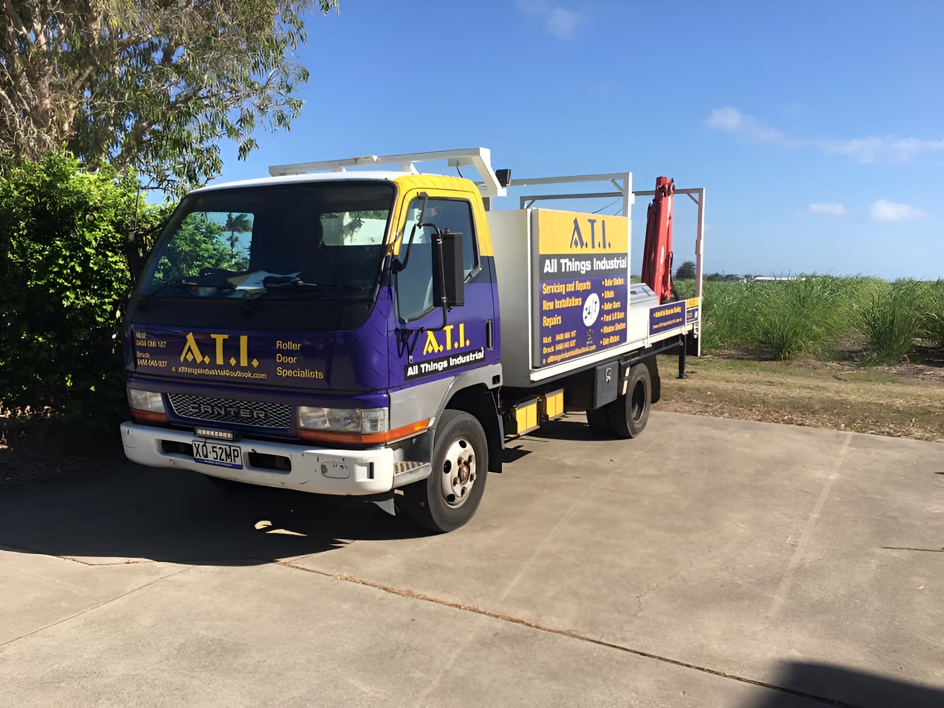 Purple and White A.T.I. Service Truck Parked Outdoors — All Things Industrial in Mackay, QLD