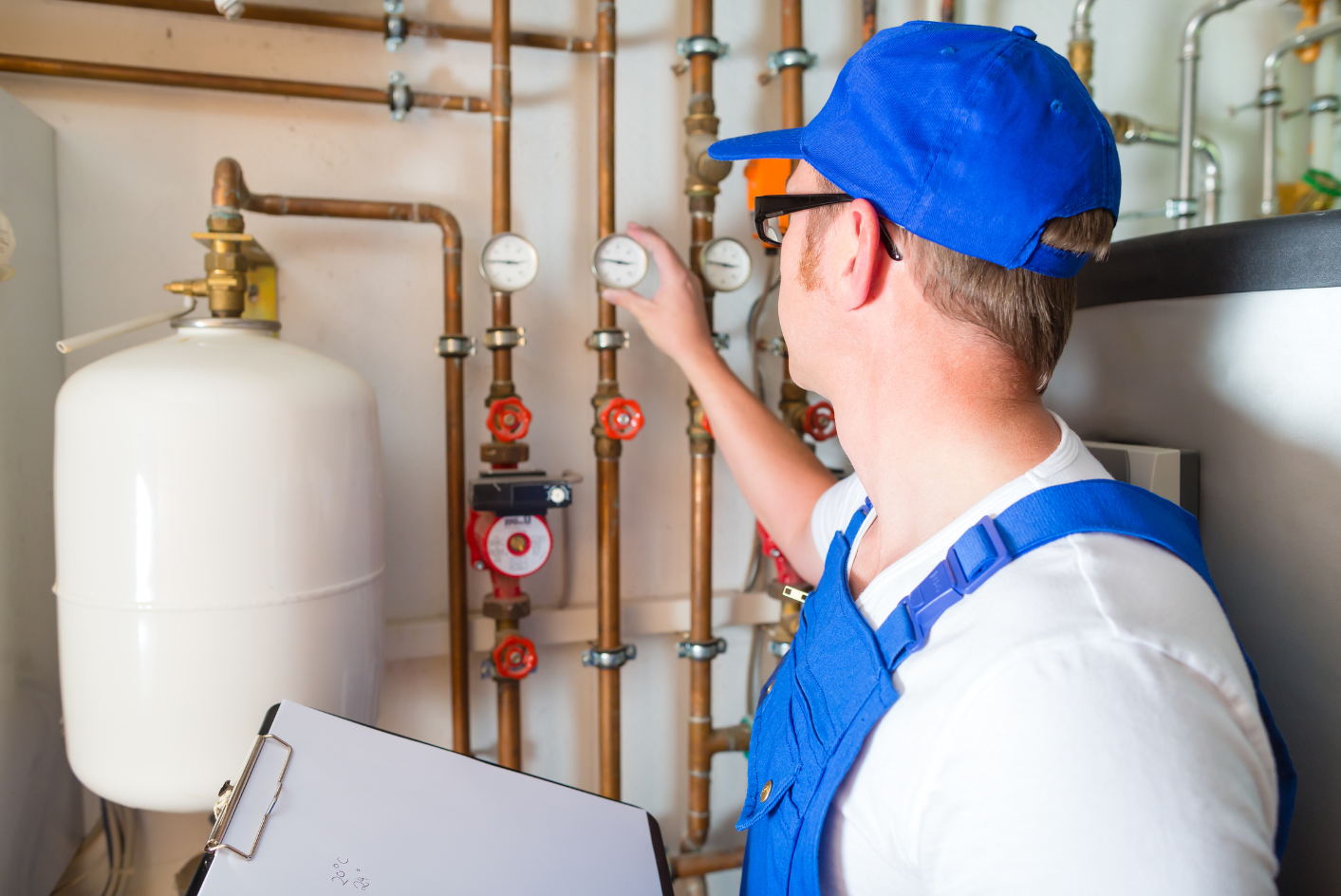 HVAC tech working in house