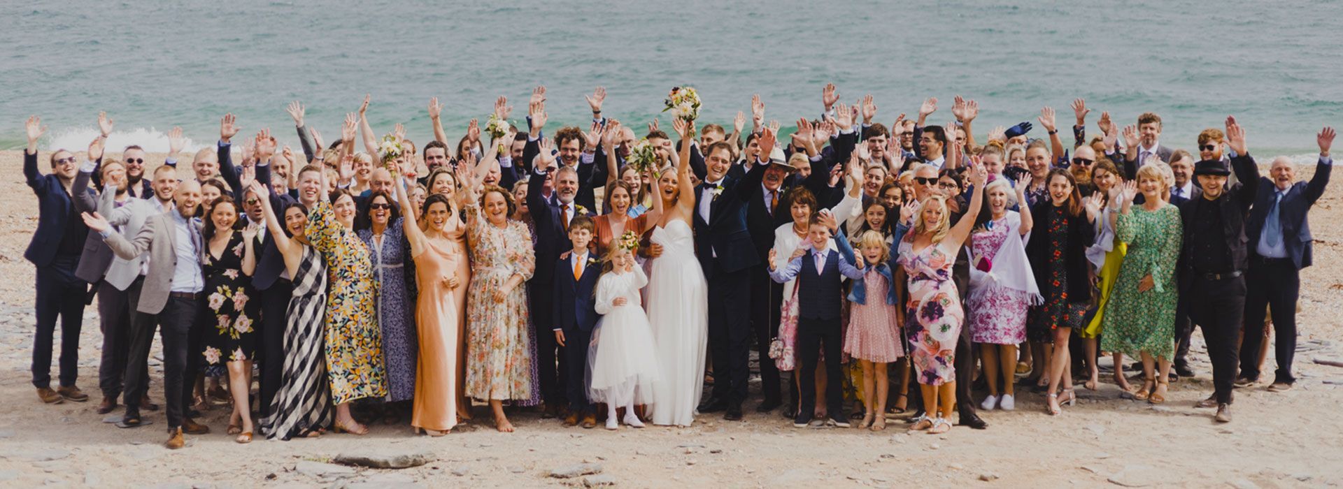 Beach wedding ceremony setting in South Devon overlooking the sea at The Grain Store Weddings near B