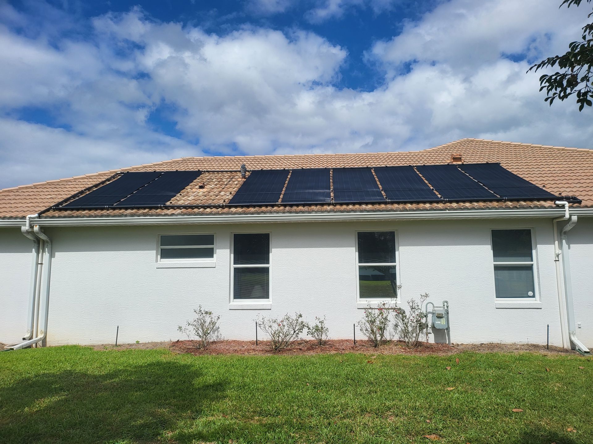 A white House with Solar Panels on the Roof | Lecanto, FL | Innovative Solar Nature Coast