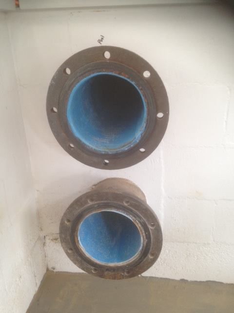 Two Pipes Are Sitting Next to Each Other on a Wall — FlowWise in Maroochydore, QLD