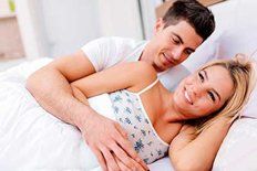 Couple on Bed | Ogden, UT | Malan Relationship Health