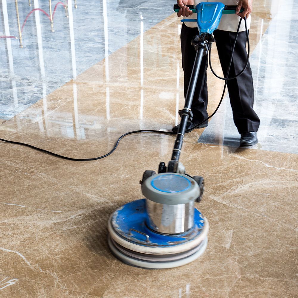 Cleaner Polishes Floor — Elizabeth, NJ — Omega Maintenance Corp