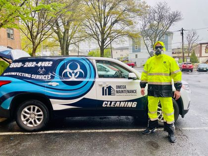 Male Worker Cleaning Corridor — Elizabeth, NJ — Omega Maintenance Corp