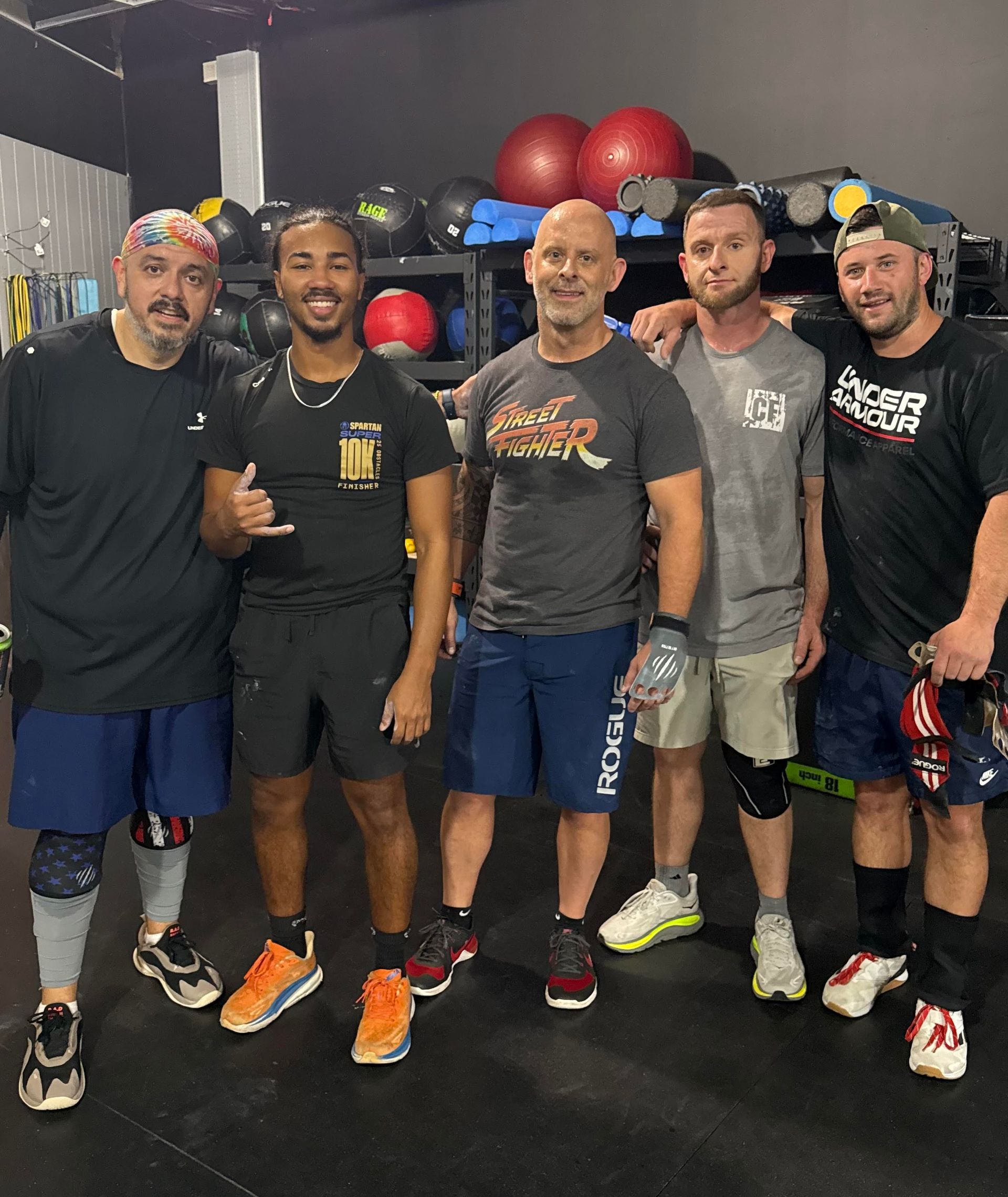 a woman is doing push ups on a bench in a gym .