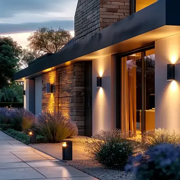 A house with a lot of lights on the side of it