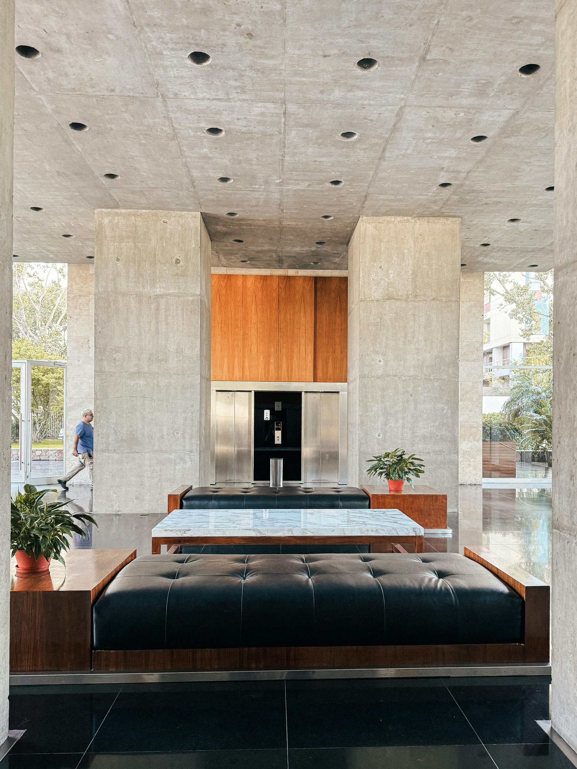 A room with a couch and a table in it