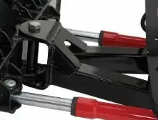 Black plow hardware with red hydraulic cylinders.