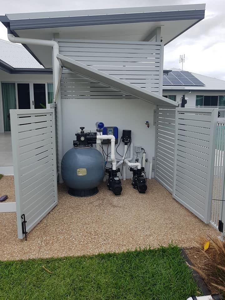 Pool Equipment Enclosure With Filter, Pumps, and Controls Behind a Louvered Fence on Gravel — Gate-O-Matic in Garbutt, QLD