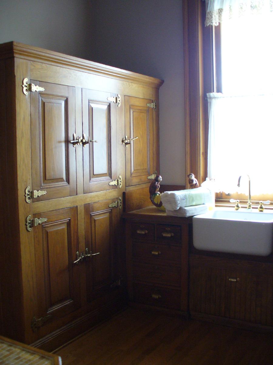 wooden cabinet and massage table
