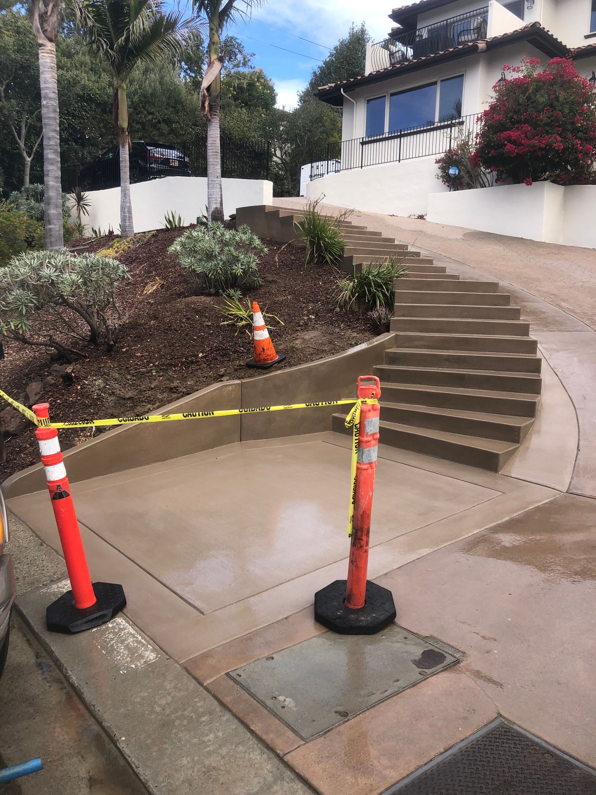 A large house with two garages in a residential neighborhood.