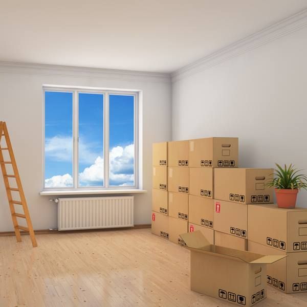 A Room Filled with Cardboard Boxes and A Ladder — Bondi Removals and Taxi Trucks in Randwick, NSW
