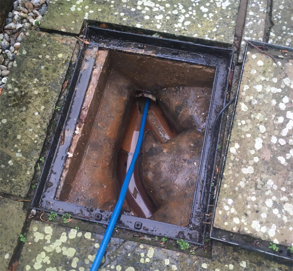 Drain being cleared