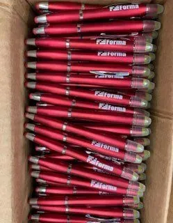 Box of red pens, each with the word