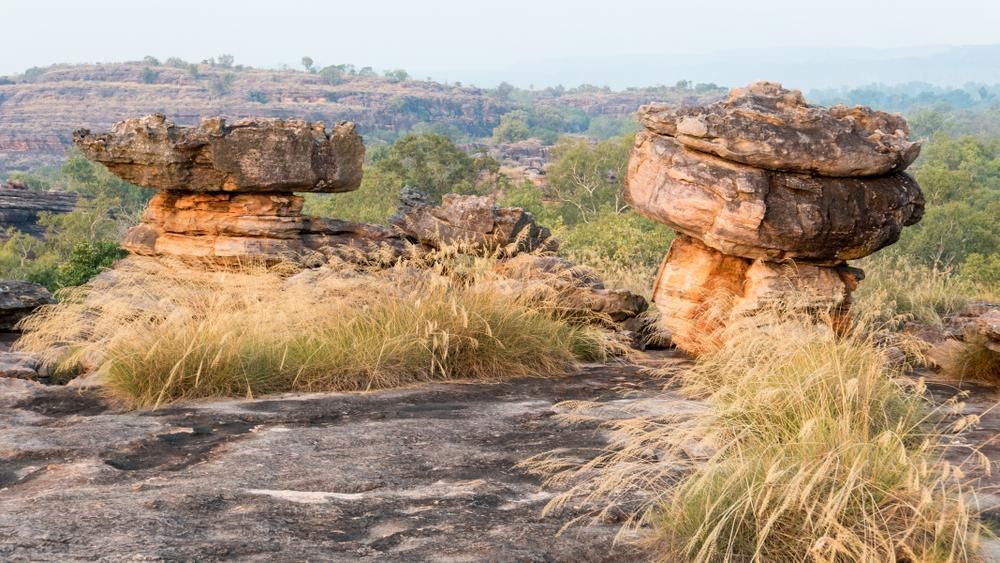 Couple of Rocks Sitting on Top of a Hill — Approved Plumbing Service in Darwin, NT