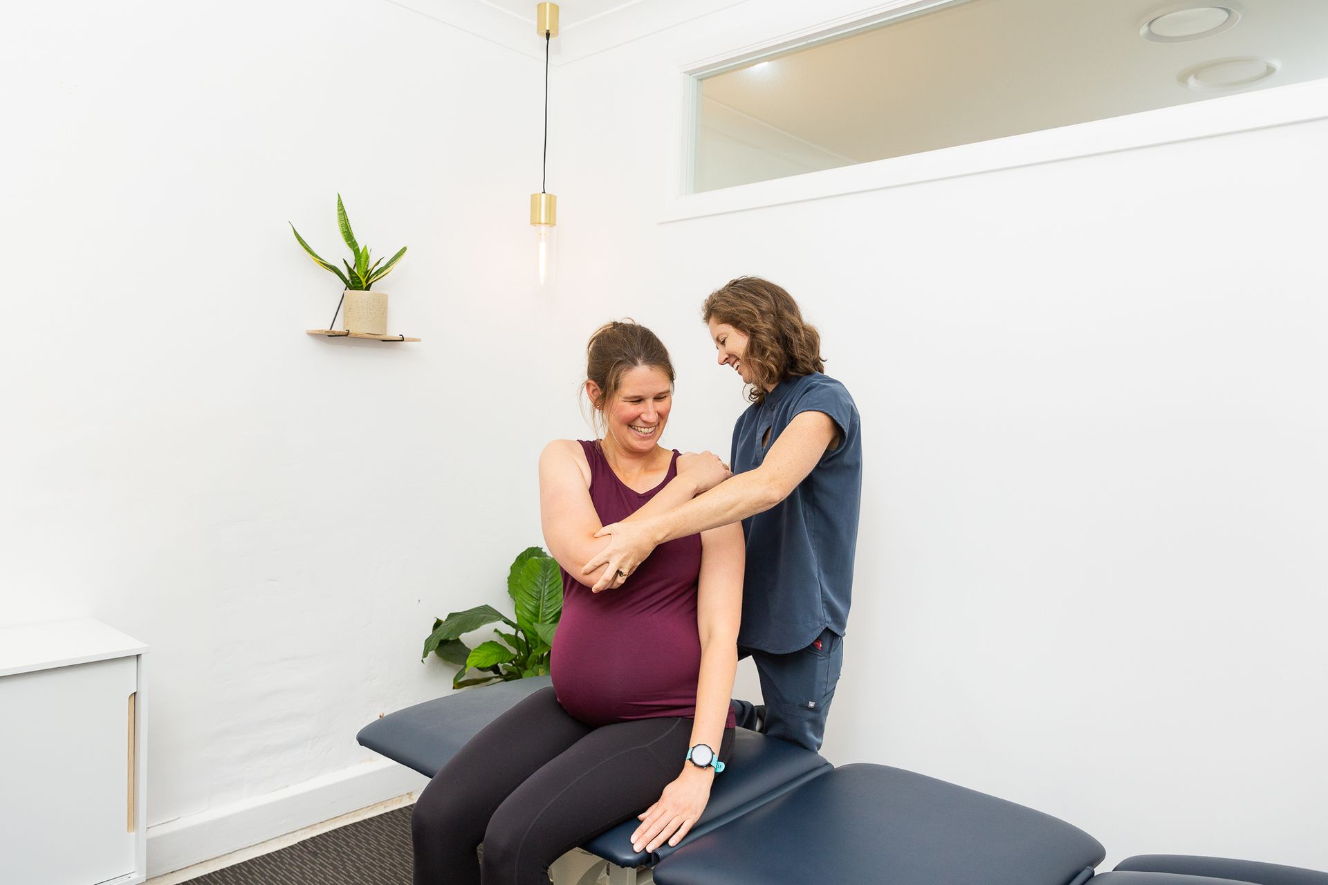 Pregnant lady going to a Osteopath in Wollongong