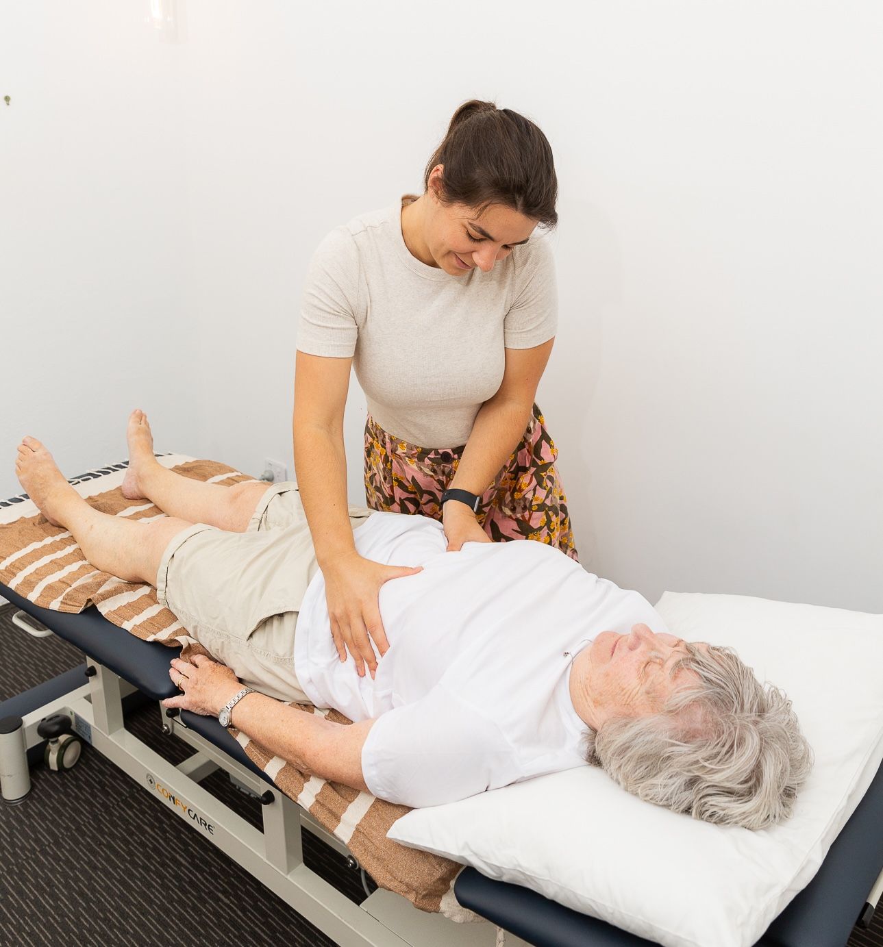 A Woman Is Getting a Massage on Her Stomach at A Spa — Align Health Therapies in Woonona, NSW