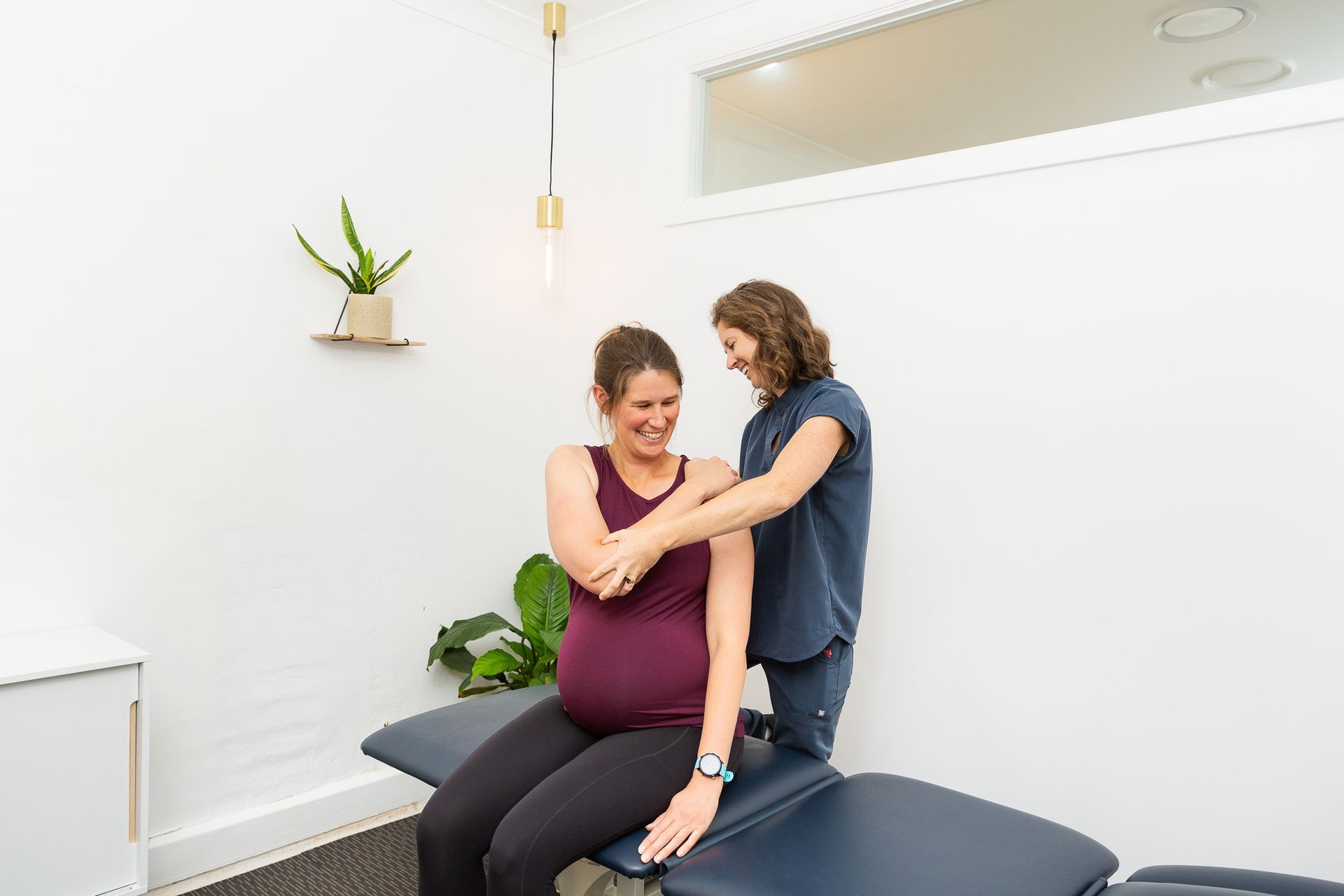 Pregnant lady going to an Osteopath in Wollongong