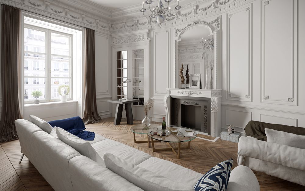 A living room filled with furniture and a fireplace.