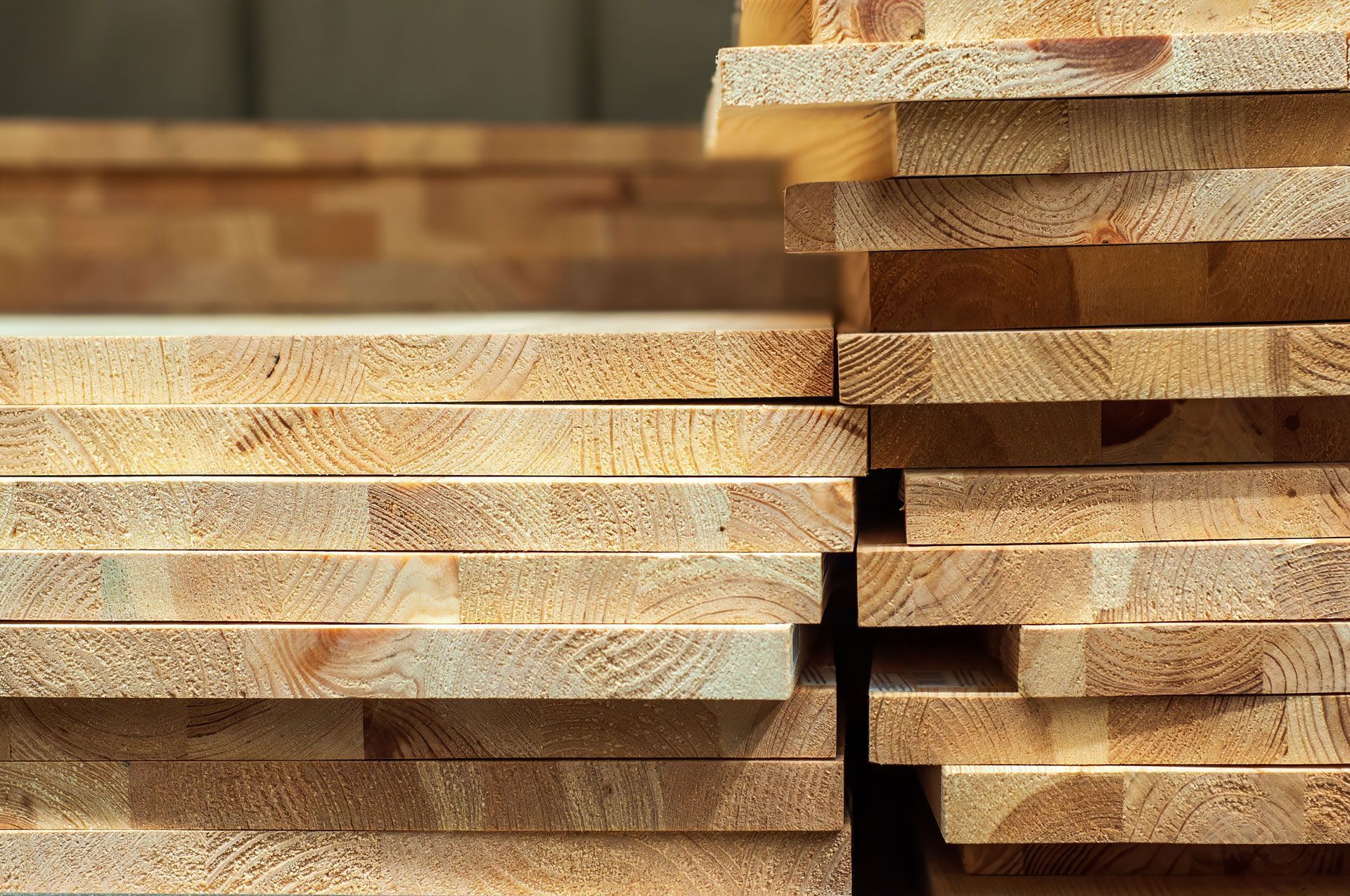 A pile of wooden boards stacked on top of each other.