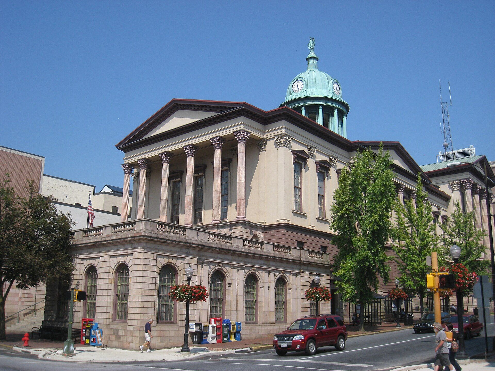 A large building with columns and a dome on top