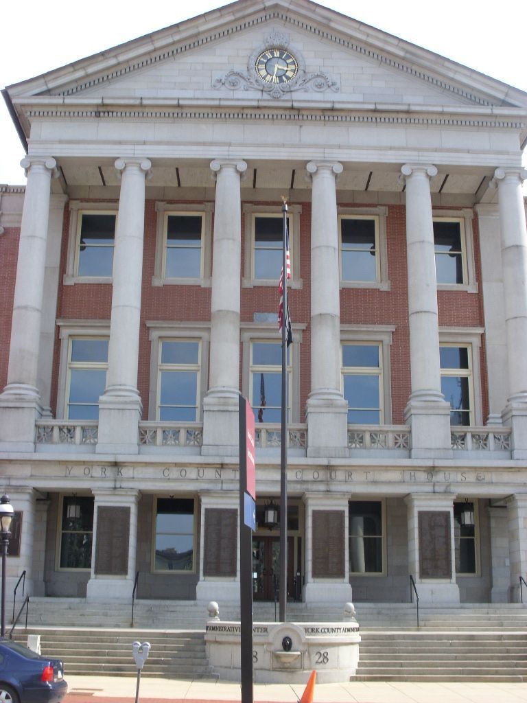 A large building with a clock on top of it