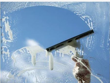 A large house with a texas flag painted on the roof