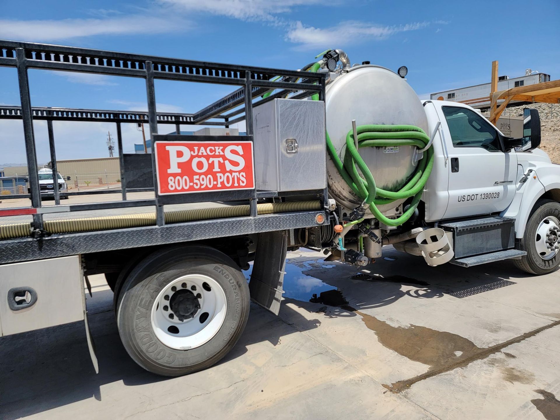 A jack pots truck is parked on the side of the road.