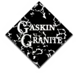 Gaskin Granite logo on a black marble diamond with white lettering