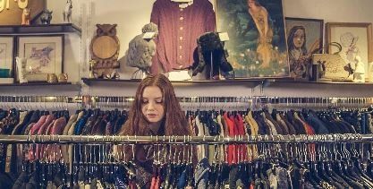 Girl looking through clothes