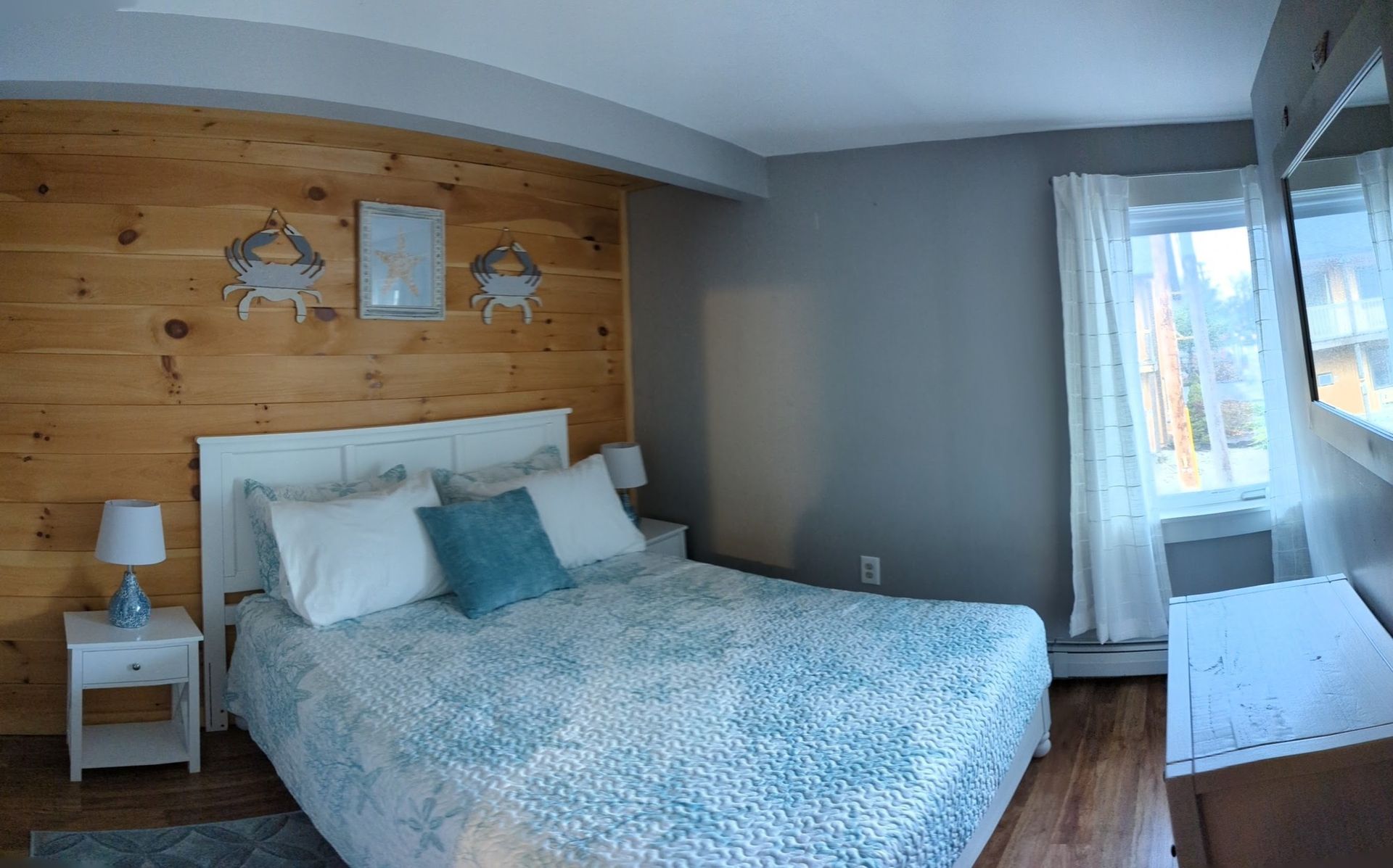 There is a large bed in the middle of the room.