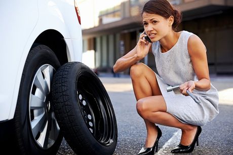 lady taking call needing road assistance