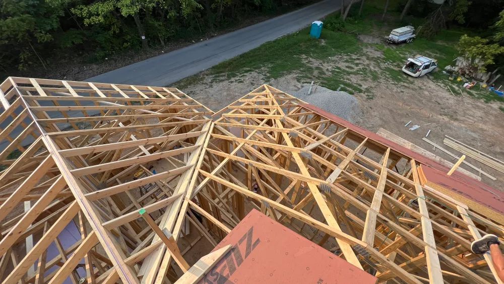 An aerial view of a wooden structure under construction.
