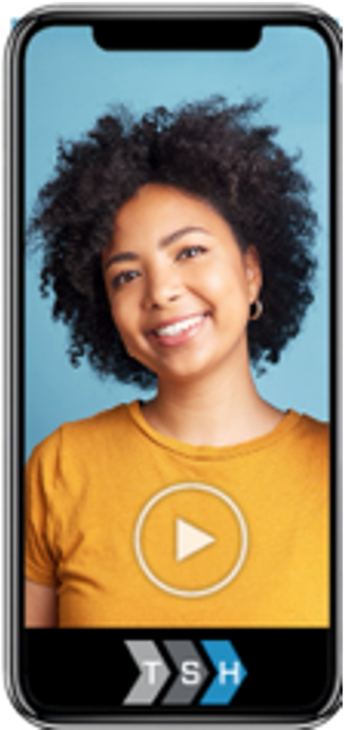 A woman in a yellow shirt is smiling on a cell phone screen.