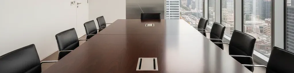Retail executive recruiters facilitating a professional business meeting in a modern office setting