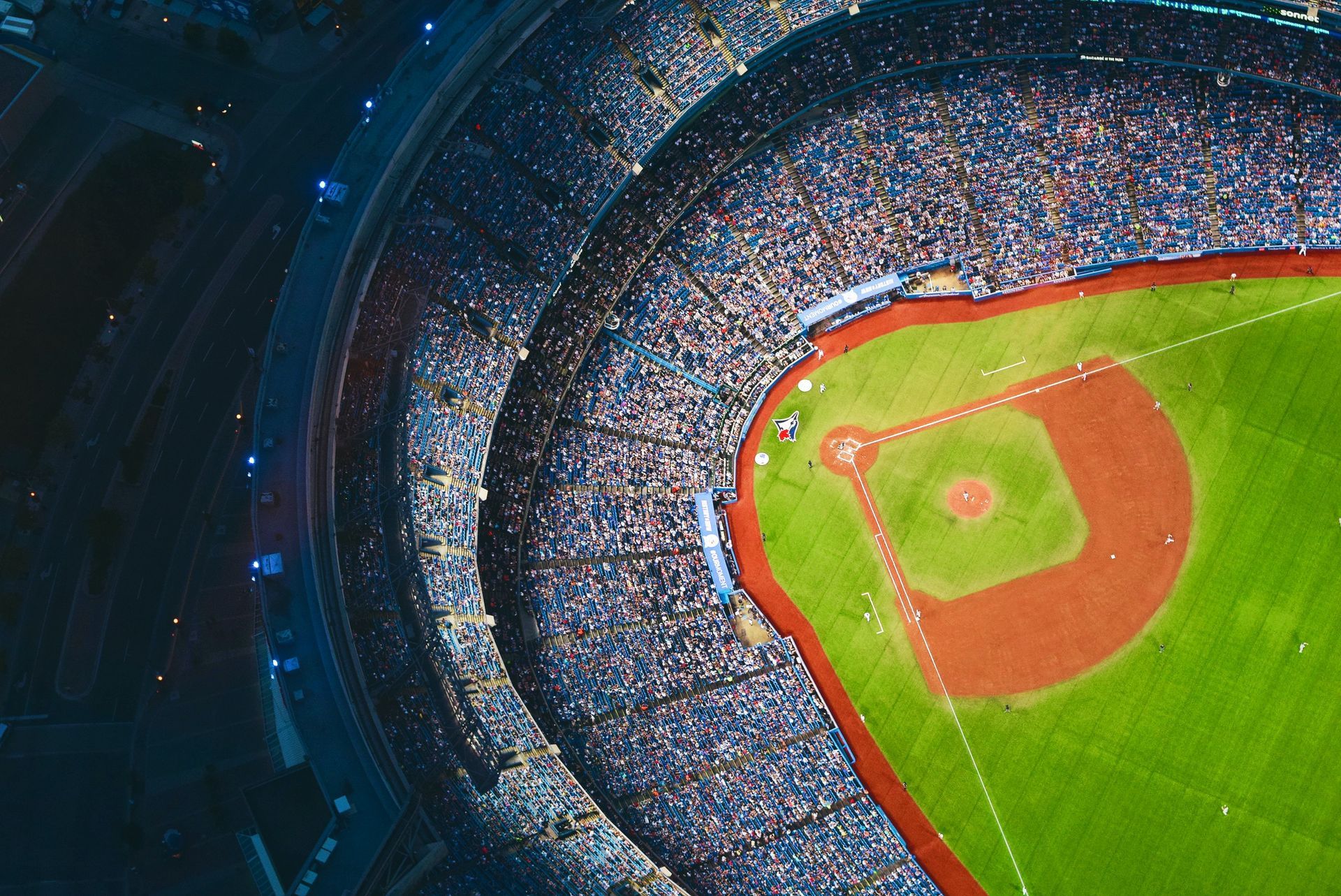 An aerial view of a baseball stadium at night