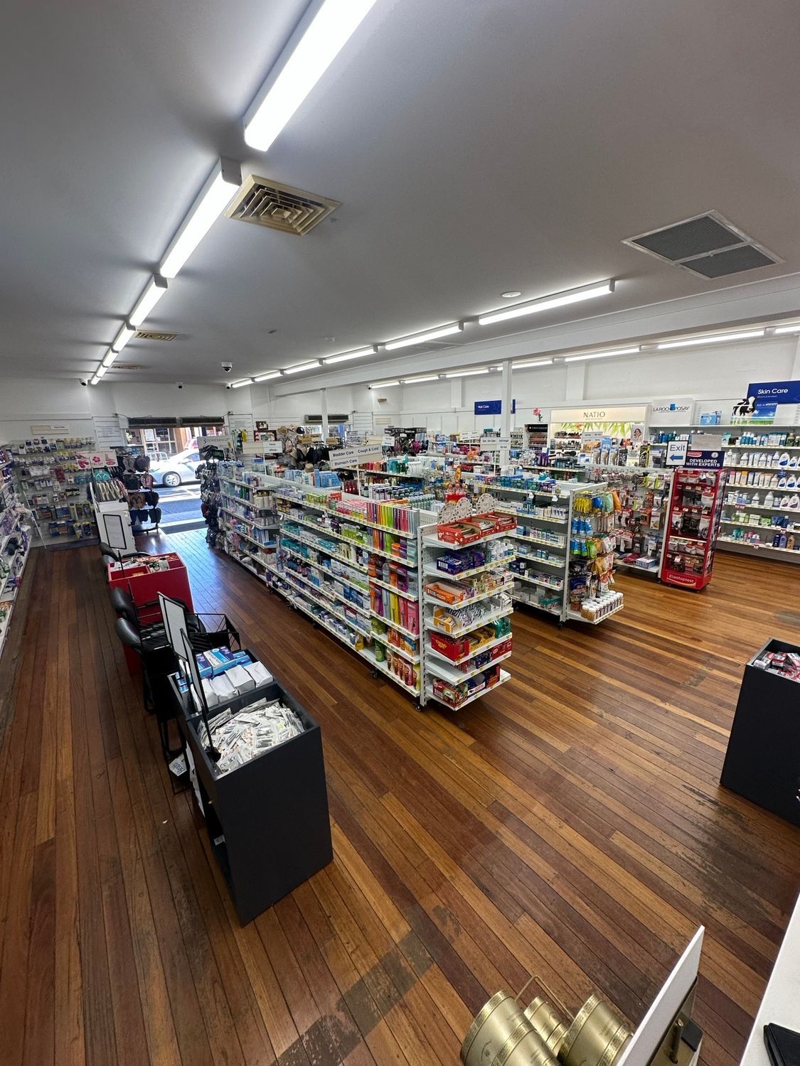 Pharmacist Drawing Blood From a Patient's Finger — Blooms The Chemist Sawtell in Sawtell, NSW
