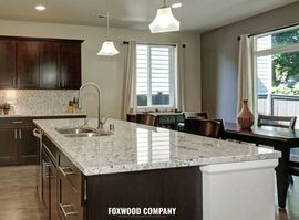 Photo showing custom kitchen features renovated by Foxwood Company.