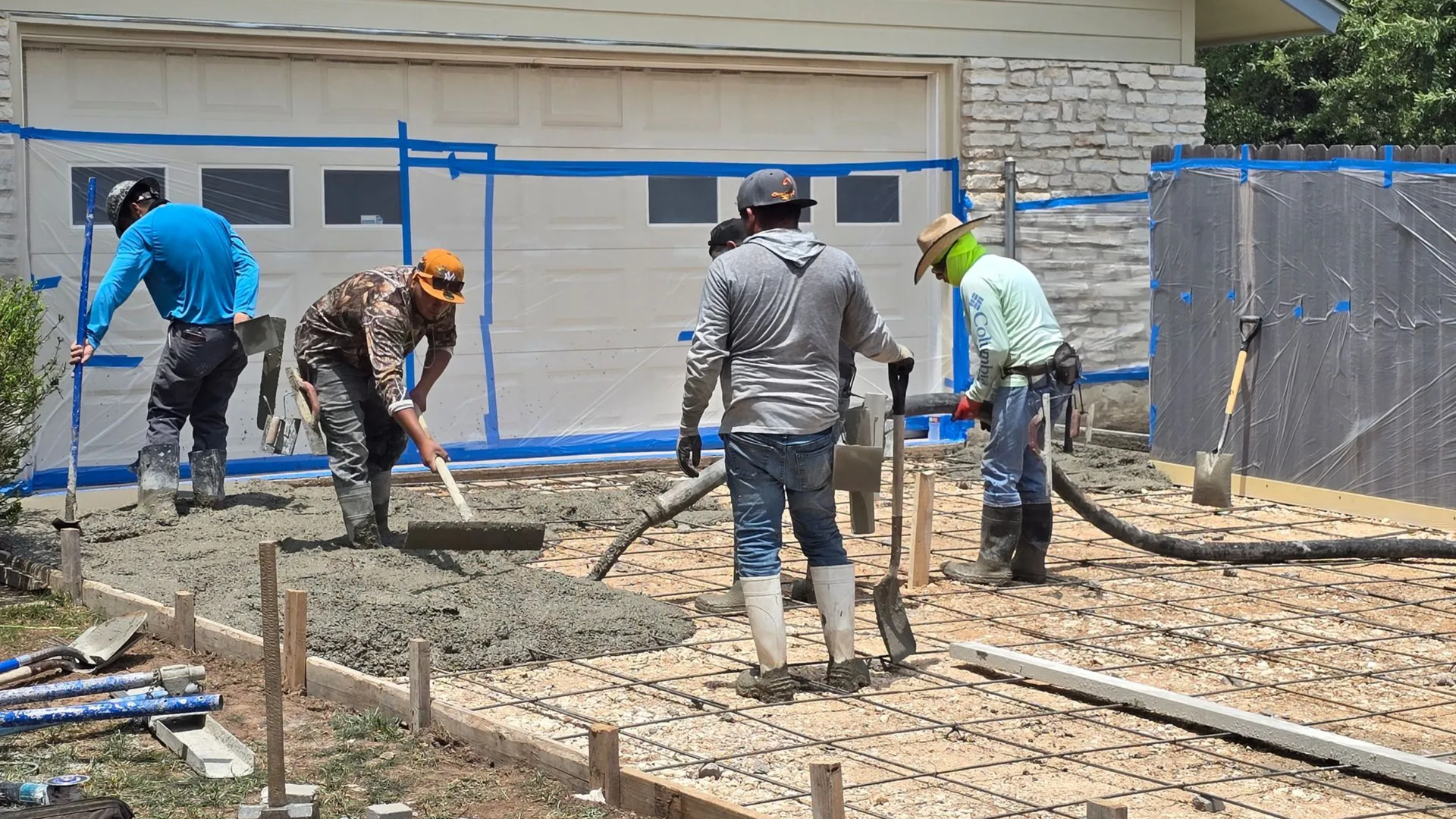 Concrete driveway installation in Austin with reinforced slab and proper grading.