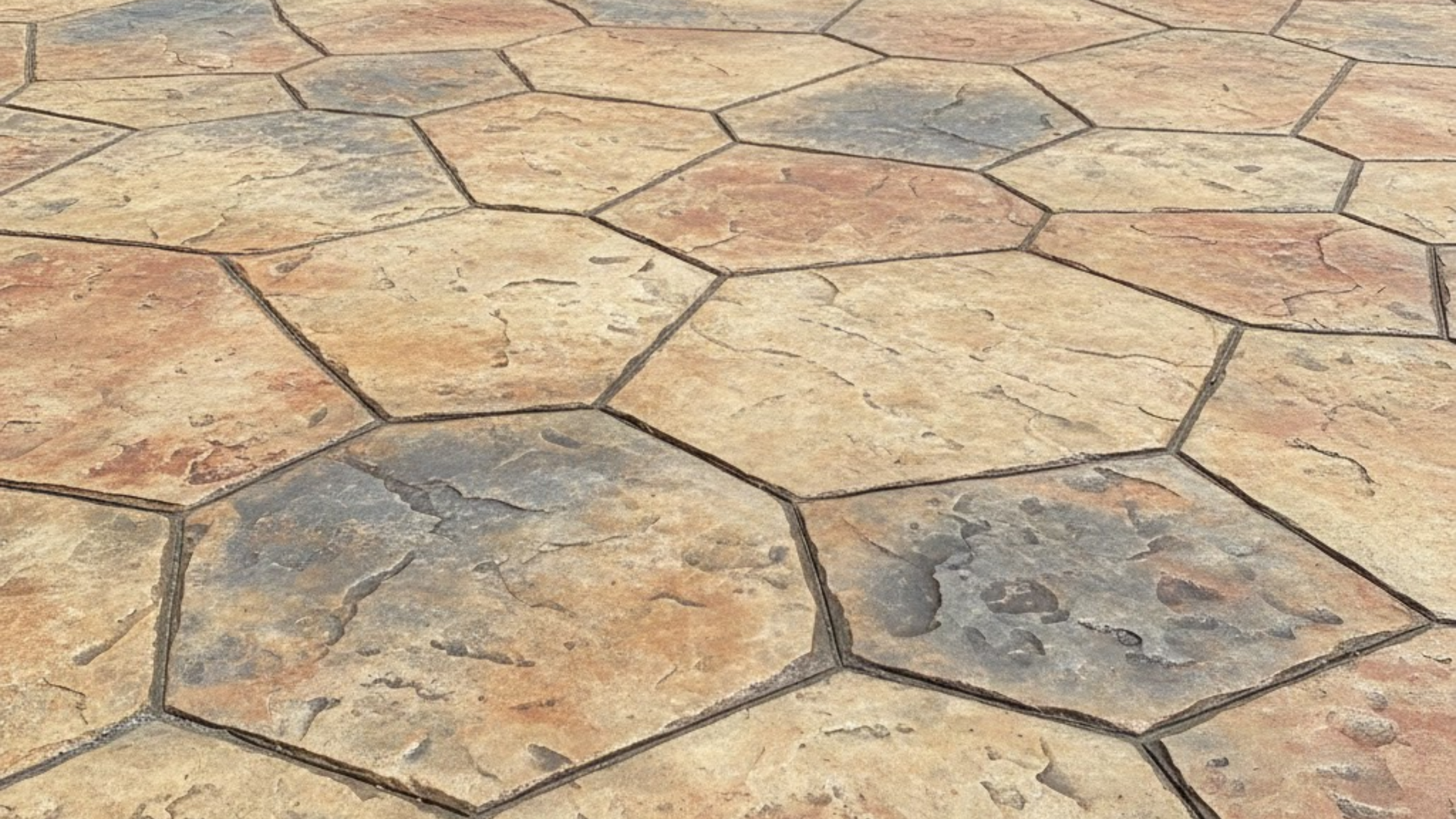 Seamless texture stamped concrete finish applied to a patio surface in Austin TX.