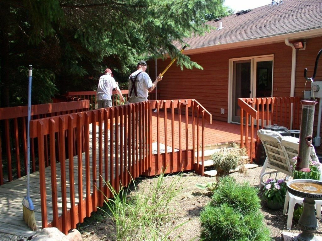 Two mans painting deck — Monona, WI — Thrift Painting